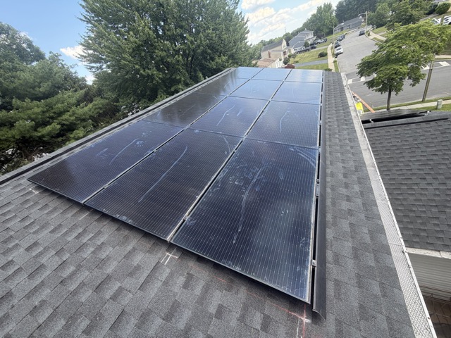 Solar panel installation viewed from the rooftop