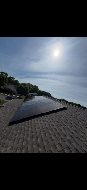 Completed solar panel installation on residential roof