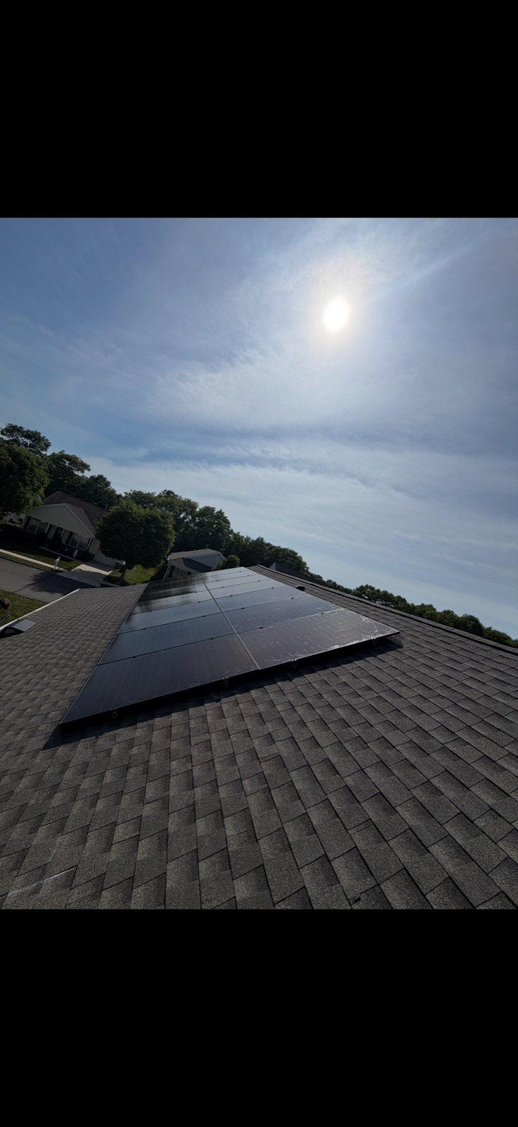 Completed solar panel installation on residential roof